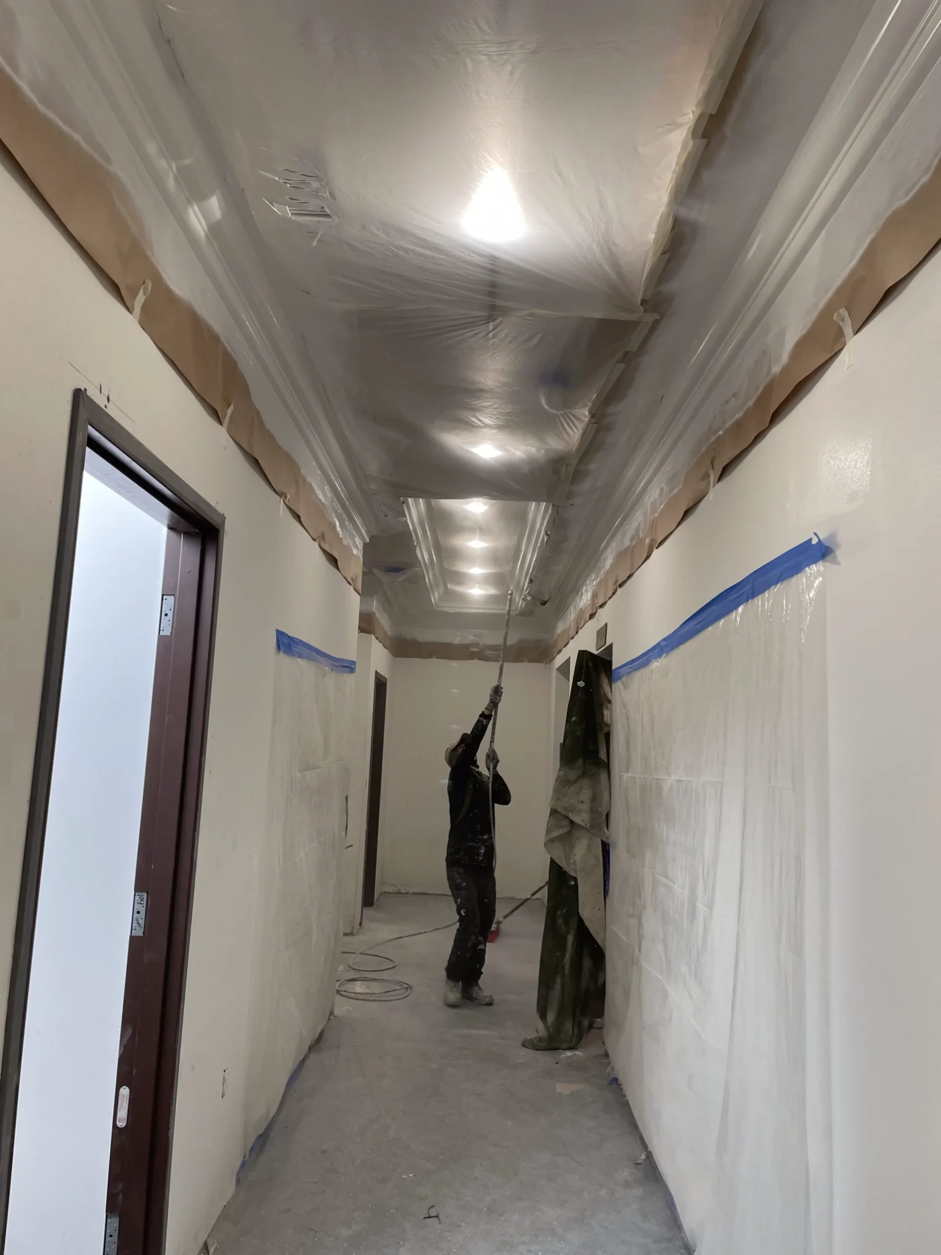 Tampa home undergoing protective preparation for interior painting