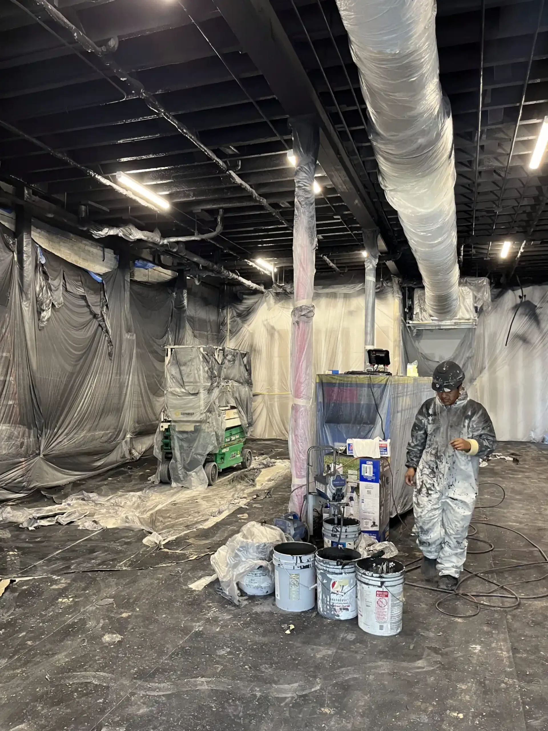 Commercial interior receiving professional painting preparation by Precision Painters