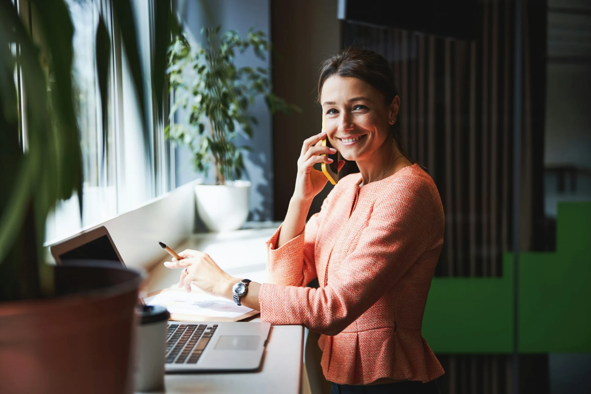 Homeowner coordinating her interior painting project with the Precision Painters team
